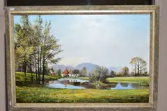 an landscape with a house set in extensive grounds with a lake to fore by Michael Morris, oil on canvas, sold May 2020