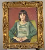 a half length portrait of a seated young man wearing a green kaftan shirt by Michael Gilbery, oil on canvas, sold Apr 2020