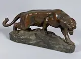 Tigre rugissant sur un tertre by Thomas François Cartier, Bronze à patine médaille, sold Nov 2018