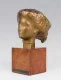 Tête d'Aphrodite by Lucien Schnegg, Epreuve en bronze à patine dorée, sold Mar 2014