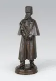 Artilleur de la Garde en manteau by Emmanuel Frémiet, Epreuve en bronze à patine brun, sold Feb 2014