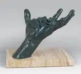 La main apaisante by Lorenzo Quinn, Epreuve en bronze à patine vert nuancé, sold Dec 2013