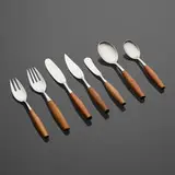 Fjord flatware by Jens Quistgaard, 1953, teak, stainless steel, sold Nov 2022