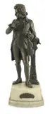 An early 20th century bronze figure of Mozart holding a violin by Carl Brose, bronze, sold Apr 2023