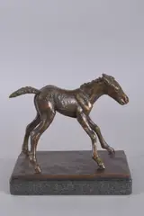 A PATINATED BRONZE FIGURE OF A YOUNG FOAL, mounted on a polished granite base by Sally Arnup, BRONZE, offered Feb 2025