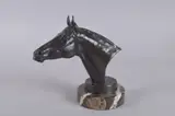 A PATINATED BRONZE BUST OF THE RACEHORSE PALL MALL, mounted on an Italian Portoro Nero circular marble base by William Newton, BRONZE, sold Feb 2025