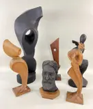 abstract and semi-abstract figural forms, and a head sculpture of St. by John Excell Wood Sculptures, sculpture, sold Apr 2023