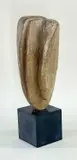 Stylised stoneware head on a black granite plinth by Peter Hayes, sculpture, offered Mar 2023