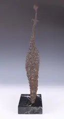 Standing figureSigned and dated 1959 on baseBronze on a marble by Xavier Corbero, 1959, Bronze on a marble base [not currently attached], sold Dec 2018