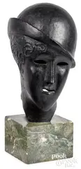 Man's Head by Elie Nadelman, bronze, sold Oct 2021