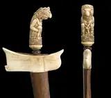 NORTH JAVA, possibly 9th – 11th century by Kris And Scabbard, steel blade decorated on each side in relief with three standing priest figures and a winged elephant, the scabbard of w, sold Oct 2013