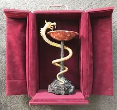 Interprétation Dalinienne de la baguette d'Esculape by Salvador Dalí, 1986, Bronze à patine brune, dorée et argentée; signé à la base, sold Oct 2018
