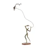 Figure Flying a Kite by Bill Lett, Copper and brass with a verdigris patina, sold Jan 2025
