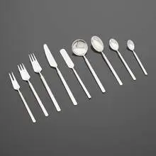 Obelisk flatware by Erik Herlow, c. 1954, stainless steel, sold Nov 2022