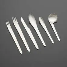 AJ Flatware by Arne Jacobsen, 1957, stainless steel, sold Nov 2022