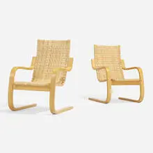 Cantilevered chairs model 406, pair by Alvar Aalto, laminated birch, cane, sold Nov 2022