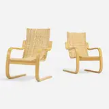 Cantilevered chairs model 406, pair by Alvar Aalto, laminated birch, cane, sold Nov 2022
