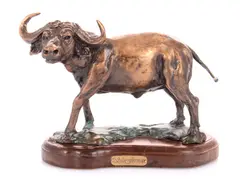 Buffalo by Sid Forman, bronze on a wooden base, sold Oct 2023