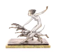Girl with Dogs by Josef Lorenzl, circa 1930, bronze on marble base, sold Oct 2023