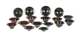 A group of seventeen similar turned wood items by Bert Marsh, sculpture, offered Apr 2022