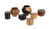 A group of five various turned wood trinket boxes by Bert Marsh, sculpture, sold Apr 2022