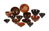 A GROUP OF TEN VARIOUS TURNED DARK WOOD BOWLS AND VESSELLS Including cocobolo, Each numbered by Ray Key, sculpture, offered Apr 2022
