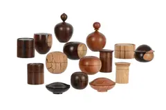 A collection of seventeen various turned wood trinket boxes and covers by Ray Key, sculpture, offered Apr 2022