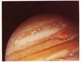 Voyager 2 by Jupiter and its moons, photograph, sold Feb 2022