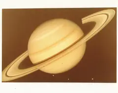 Voyager 1 by Saturn and its moons, photograph, sold Feb 2022