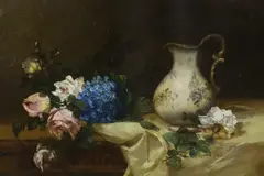 Still life of flowers and a jug upon a table top by Alfred Rouby, oil on wood, sold Nov 2022