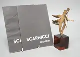 A cast bronze abstract figure by Emanuele Scarnicci, bronze, sold Nov 2022
