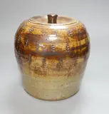 A brown glazed stoneware jar and cover by William Marshall, sculpture, sold Nov 2022