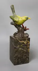 A 20th century cold painted bronze model of a yellow bird by Miguel Ferdinand Lopez, bronze, sold Oct 2022