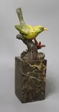 A 20th century cold painted bronze model of a yellow bird by Miguel Ferdinand Lopez, bronze, sold Oct 2022