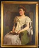 A portrait of a seated lady holding a book by Kenneth Edwin Wootton, 1909, oil on canvas, sold Jan 2025