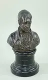 On a circular ebonised plinth by Henry Snell Gamley, bronze, sold Jul 2022