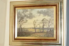A landscape with wind blown trees to the foreground by Clive Browne, acrylic on board, sold Jan 2020