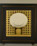 'Going For Gold', a limited edition print of a smiling figure, 64/95, by Doug Hyde, print, sold Dec 2019