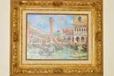 a Venetian townscape with gondolas to the foreground, signed lower by Antonio Gravina, oil on canvas, sold Nov 2019