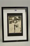 of an unknown athlete crossing the finishing line in a race, the picture is signed by the athlete by Framed And Glazed Photograph, PHOTOGRAPH, sold Oct 2019