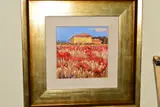 A tuscan landscape with poppies to the fore by Bruno Tinucci, oil on canvas, sold Jun 2019