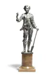 A lead figure of a late 18th century gardener, holding a flower in one hand and a spade in the other by Georges Van der Straeten, sculpture, offered Oct 2018