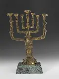 Menora Signed and numbered 5/8 Bronze on a marble base 48 by Salvador Dalí, Bronze on a marble base, sold Jun 2018