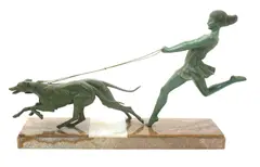 Woman with Hounds, a verdi gris patinated metal sculpture on stepped onyx base, scratched signature to base, 62cm by George Maxim, sculpture, sold Mar 2018