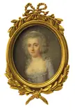 Portrait miniature of a lady, half length, wearing a blue dress, a white ribbon in her hair Oval in a gilt metal frame 70 x 60mm by Jean-Baptiste Jacques Augustin, watercolor, sold Mar 2018