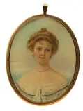 Portrait miniature of a lady, bust length Signed Oval, in a gilt frame, blue glass reverse 90 x 70mm by Florence Hannam, watercolor, sold Mar 2018
