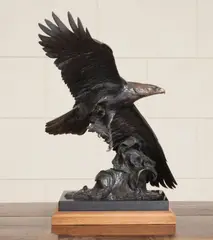 On the Crest of a Wave (Eagle with wings spread) by Veryl Goodnight, patinated bronze with dark brown patina on marble and wooden bases, sold Dec 2014