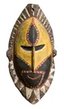 (East Sepik Province, Papua New Guinea) by An Abelam Yam Harvest Ceremony Mask, c.1960, natural earth pigments on carved wood, sold Mar 2013