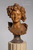 Portrait de jeune femme by Louis-Jaques Guigues, Épreuve en terre cuite signée reposant sur un piédouche en marbre, sold Jan 2023