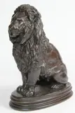 Lion assis by Antoine-Louis Barye, Épreuve en bronze à patine brune nuancée, sold May 2025
